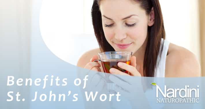 Benefits of St. John's Wort | Woman with a brewed cup of St. Johns Wort | Dr. Pat Nardini Naturopathic Doctor and Thyroid Specialist | Nardini Naturopathic Toronto
